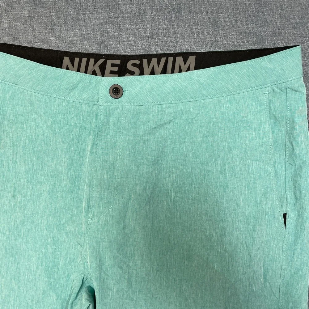 Nike Swim Board Shorts 38 Aqua Green Swoosh Logo Flat Front Slash Pockets Summer